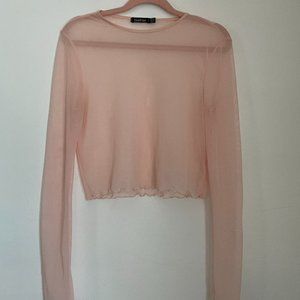 frilly see-through pink shirt